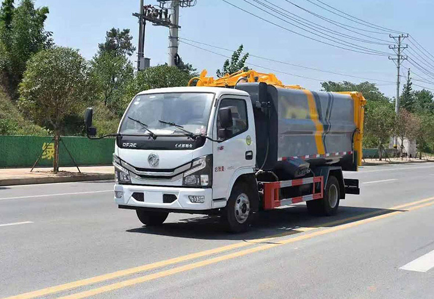 東風(fēng)多利卡壓縮垃圾車左側(cè)展示圖